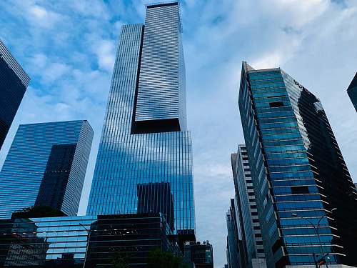 office building high-rise buildings under blue sky city
